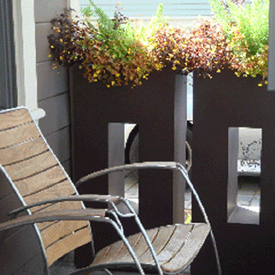 Two vertical Box Planters front porch