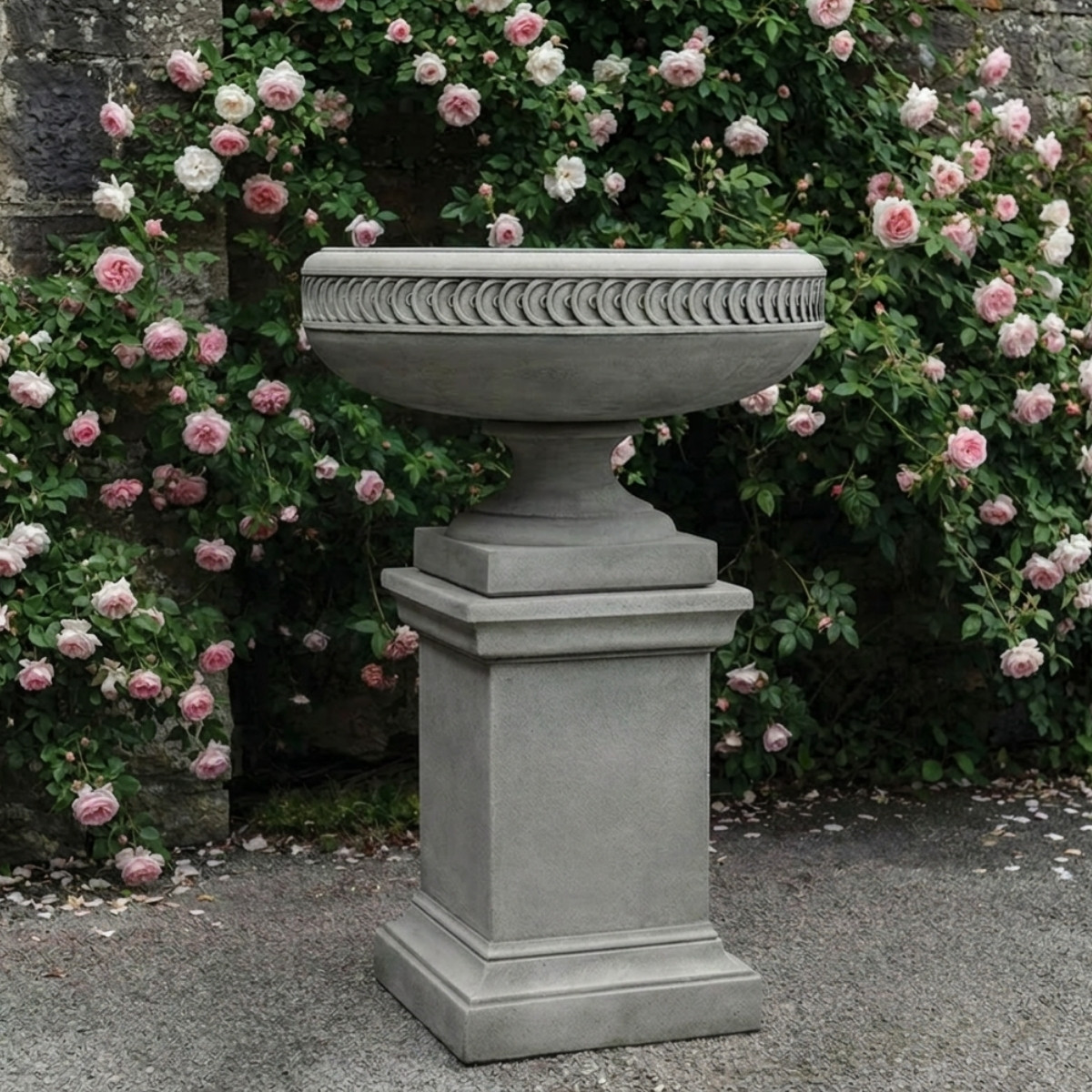 Chatham urn w/ greenwich pedestal by campania international in cast stone, shown as an urn planter