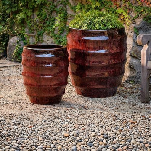 Campania international pomerol planters showing rounded vessel shape in terracotta for outdoor planting spaces