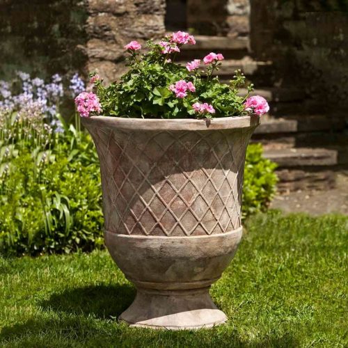 Campania international pomezio urns showing rounded vessel shape in terracotta for outdoor planting spaces