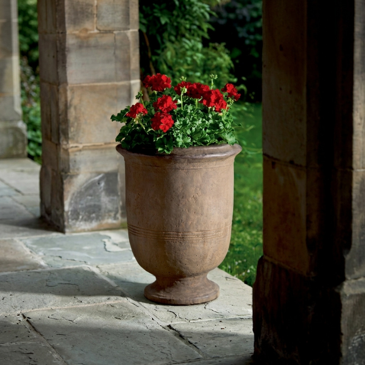 Provencal large urn by campania international in cast stone, shown as an urn planter