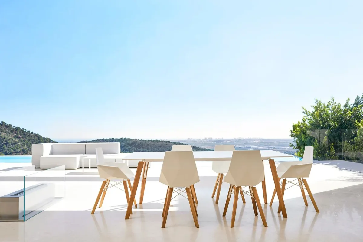Vondom-Faz-Wood-Stool-Dining-Arrangement Outdoor dining set arranged on a view overlooking the mountains