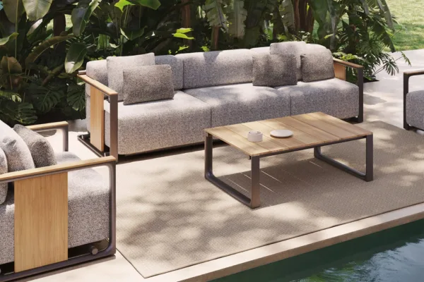 Vondom-Tulum-3-Seater-Sofa-Detail Tulum collection 3 seater sofa with matching teak coffee table on a poolside patio surrounded by greenery
