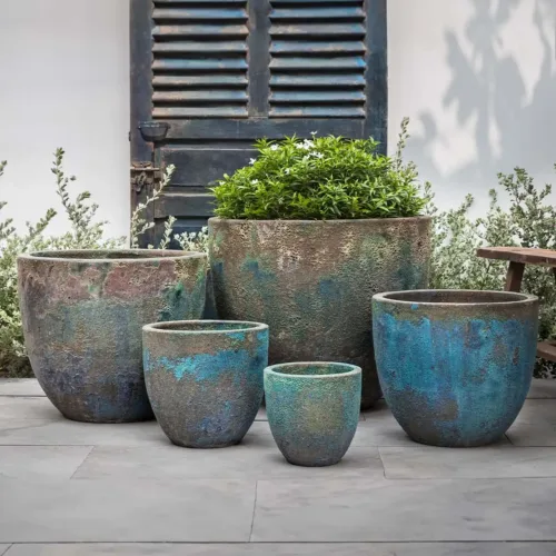 Apero planter blue verdigris set of 5 glazed outdoor planters on patio
