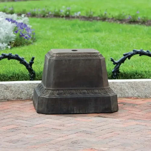 Smithsonian egg and dart cast stone pedestal in nero nuovo