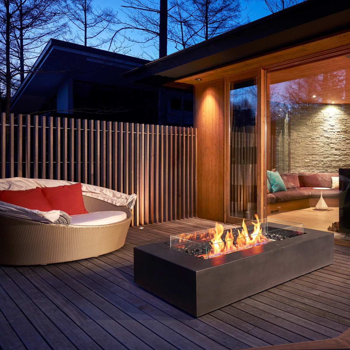Modern concrete fire table in a contemporary lounge area